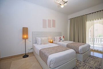 Interior design of twin bedroom in luxury house