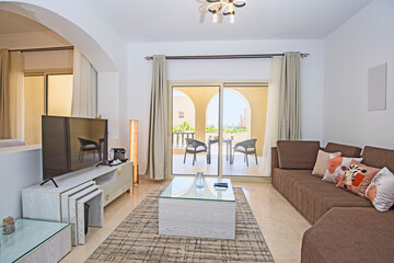 Interior design of luxury apartment living room with balcony terrace