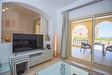 Interior design of luxury apartment living room with balcony terrace