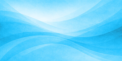 Naklejka premium A soft blue abstract background featuring flowing wavy lines and a vector design pattern that mimics the smooth motion of water and sea waves in a business wallpaper