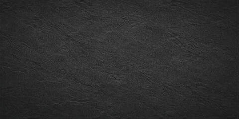 A dark grey textured leather surface with a rough macro pattern serves as a high-quality material backdrop for professional fabric and textile design wallpaper