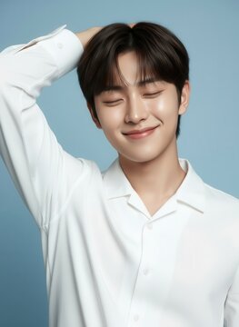Youthful Radiance: Handsome Young Korean Man with K-pop Idol Visuals and Boyish Charm, Famous asian beauty male actor perfect korean appearance kpop idol stylish clothes