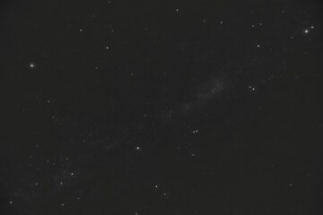 Obraz premium Deep space background featuring a vast field of stars and distant galaxies in a dark cosmic night sky for astronomy and science themes.