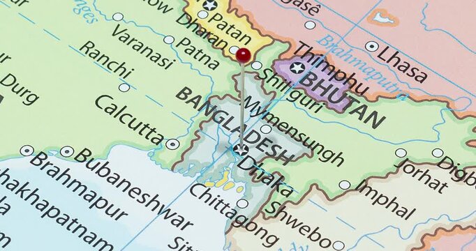 A zoom out of a red pin into dhaka city of bangladesh political map