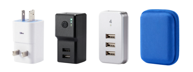 Photograph of four USB charging devices: white with two ports, black with two ports, silver with two ports, and blue fabric pouch.