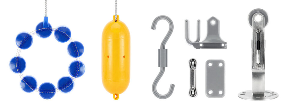 Photograph of various objects: blue pom-pom necklace, yellow cylindrical object, gray metal hook, gray metal bracket, gray metal rod, clear glass base, all on.