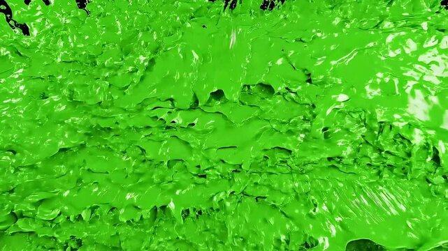 Thick green paint splashes from the corners and collides in the center to cover the black screen completely