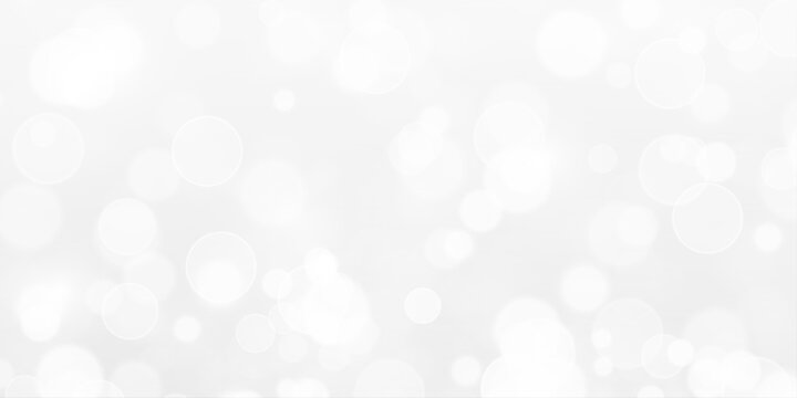 Luxury silver bokeh, glittering starlight background. Bright festive glow, elegant holiday decoration design.