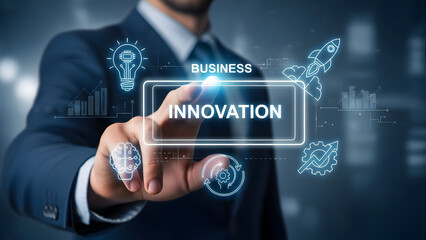 Businessman touching innovation button with glowing icons