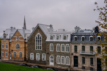Historic stone and brick buildings with metal roofs in Old Quebec