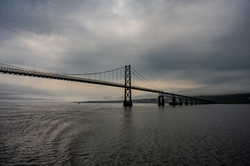 Suspension bridge over the Saint Lawrence River at dusk