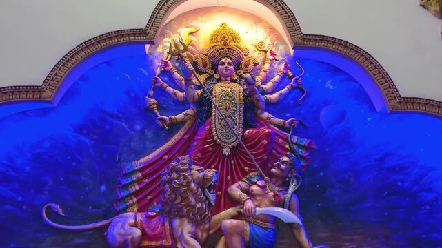 Goddess Durga in her powerful Mahishasura Mardini form, depicted with multiple arms holding sacred weapon