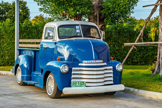 NAKHON RATCHASIMA, THAILAND-DECEMBER 13,2020 : Beautiful Classic Chevrolet Half Ton COE or Cab Over Engine vintage truck restored antique American pickup truck and retro blue paint at PTT gas station.