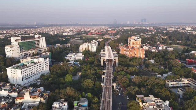Sukhdev Vihar Metro station Indian rises above South Delhi&rsquo;s leafy streets, symbolising unity and pride as city life flows quietly below in this striking aerial view of the capital.