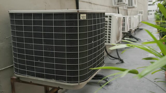 Residential Apartment HVAC Outdoor Condenser Units Installed Along Building Corridor, 4K 60fps Video Footage