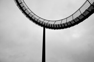 Stairway to heaven at the ruhr area. Black and white stairways. Isolated in front of cloudy sky.