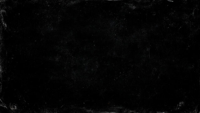 A completely black textured image with a grainy appearance and subtle variations in darkness displayed