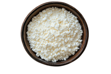 Nutritious fresh cottage cheese in rustic wooden bowl top view Healthy on transparent background