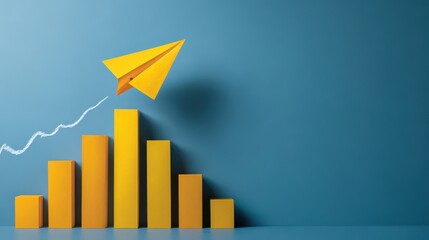 Yellow paper airplane flying over a chart on a blue background representing business growth, success and startup concept
