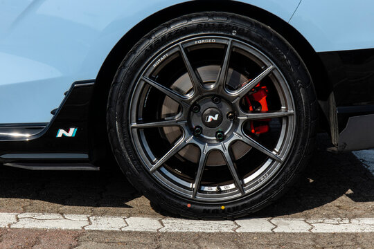 February 26, 2021, Seoul, South Korea - A close-up view of the forged alloy wheel and red brake caliper on a Hyundai Veloster N DCT performance car.