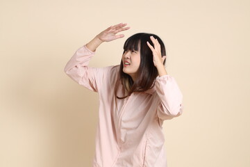 20s Asian woman in pink UV jacket