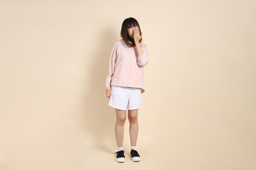 20s Asian woman in pink UV jacket