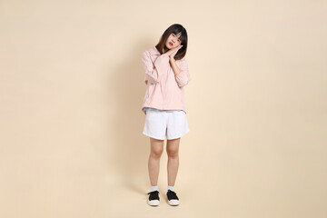 20s Asian woman in pink UV jacket