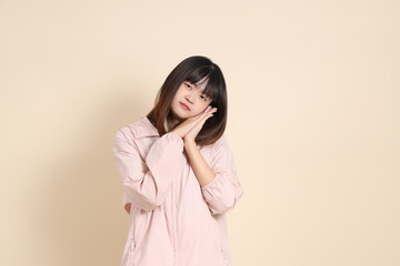 20s Asian woman in pink UV jacket