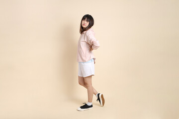 20s Asian woman in pink UV jacket