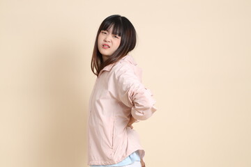 20s Asian woman in pink UV jacket