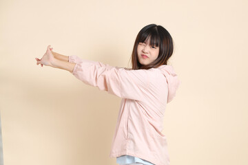 20s Asian woman in pink UV jacket