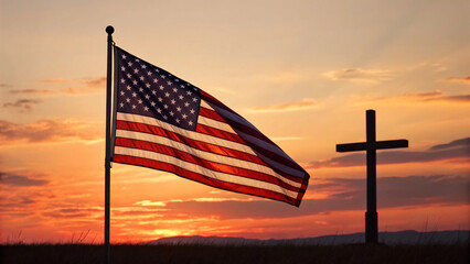 Sunset view of American flag and cross on a clear evening near a field