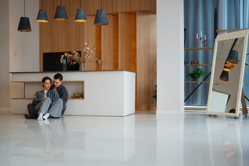 Cozy moment between a couple in a modern living space with stylish decor