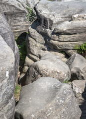 The stunning view of An unusual outcrop of natural sandstone rocks on Wellington Rocks at Tunbridge Wells Common. use it as your Wallpaper, Poster and Space for text, Selective focus.