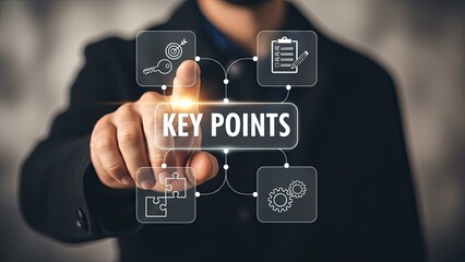Businessman interacting with key points graphic interface