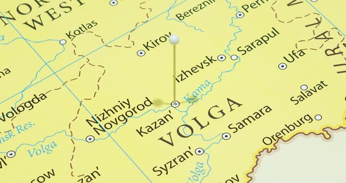 A zoom out of a white pin into kazan city of russia political map