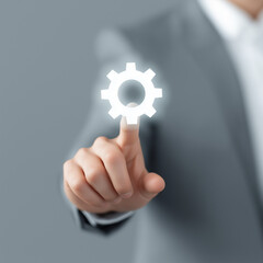  businessman touching holographic gear icon 