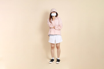 20s Asian woman in pink UV jacket