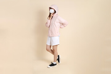 20s Asian woman in pink UV jacket