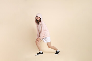 20s Asian woman in pink UV jacket