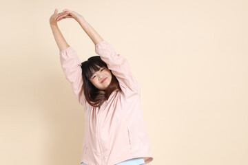 20s Asian woman in pink UV jacket