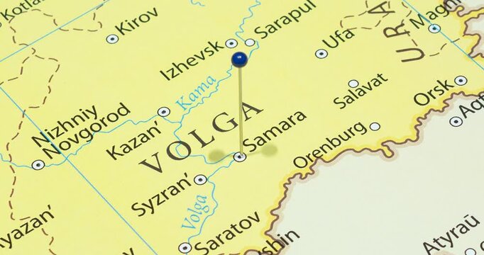 A zoom out of a blue pin into samara city of russia political map