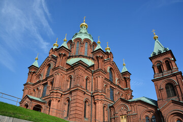 Obraz premium Uspenski Cathedral is an Eastern Orthodox cathedral in Helsinki, Finland, dedicated to the Dormition of the Theotokos (the Virgin Mary).