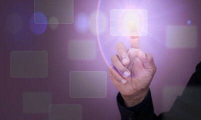 Man touching digital virtual buttons on hologram screen with his finger