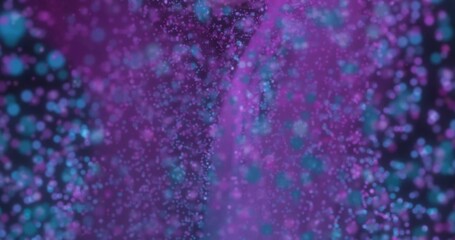 Abstract purple and blue particles floating in space, forming a soft glowing digital background.