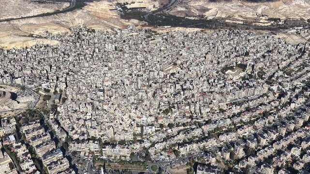 Aerial shot showing captures general views of the Syrian capital, showing roads, neighborhoods, and urban areas from above as the year comes to an end.
