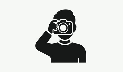 A minimalist depiction of a photographer taking a picture with a camera