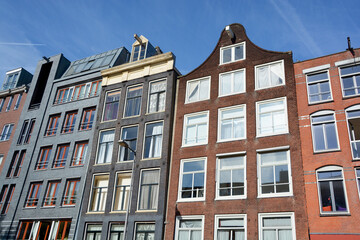 Fototapeta premium Typical canal Houses . Canal houses usually had a basement and a loft and attic where trade goods could be stored