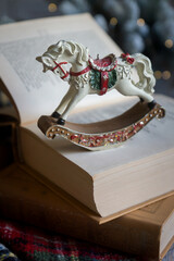 New Year's treats on the table and the symbol of the new 2026: a horse, tea, coffee, gingerbread and zephyr.