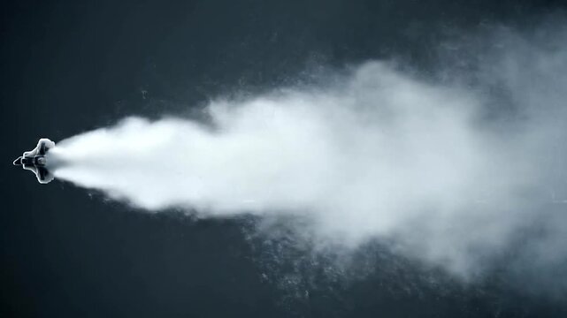 Jet Ski Water Spraying in Dark Water.